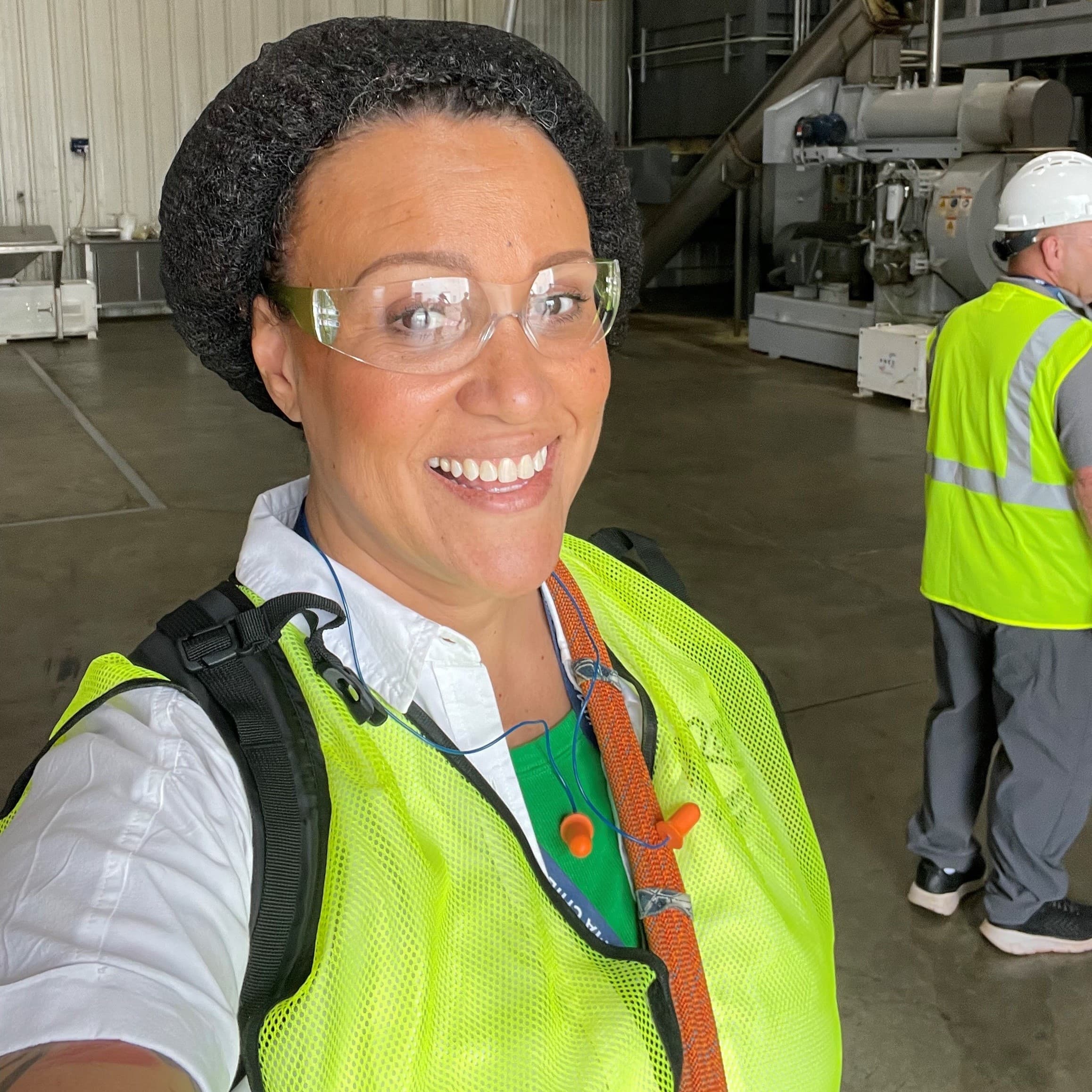 Brewer stands in warehouse