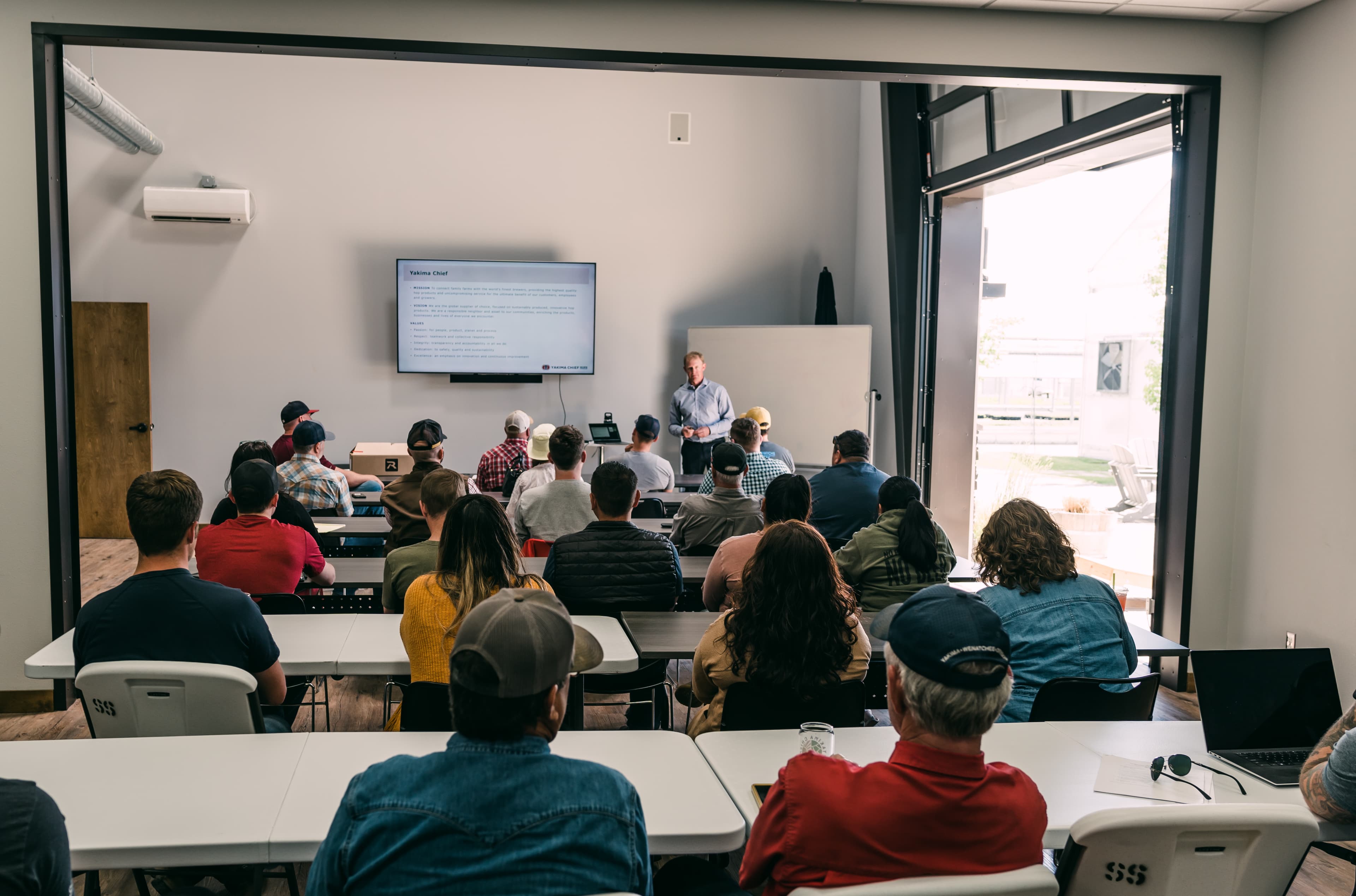 Hop farmers gathered in meeting