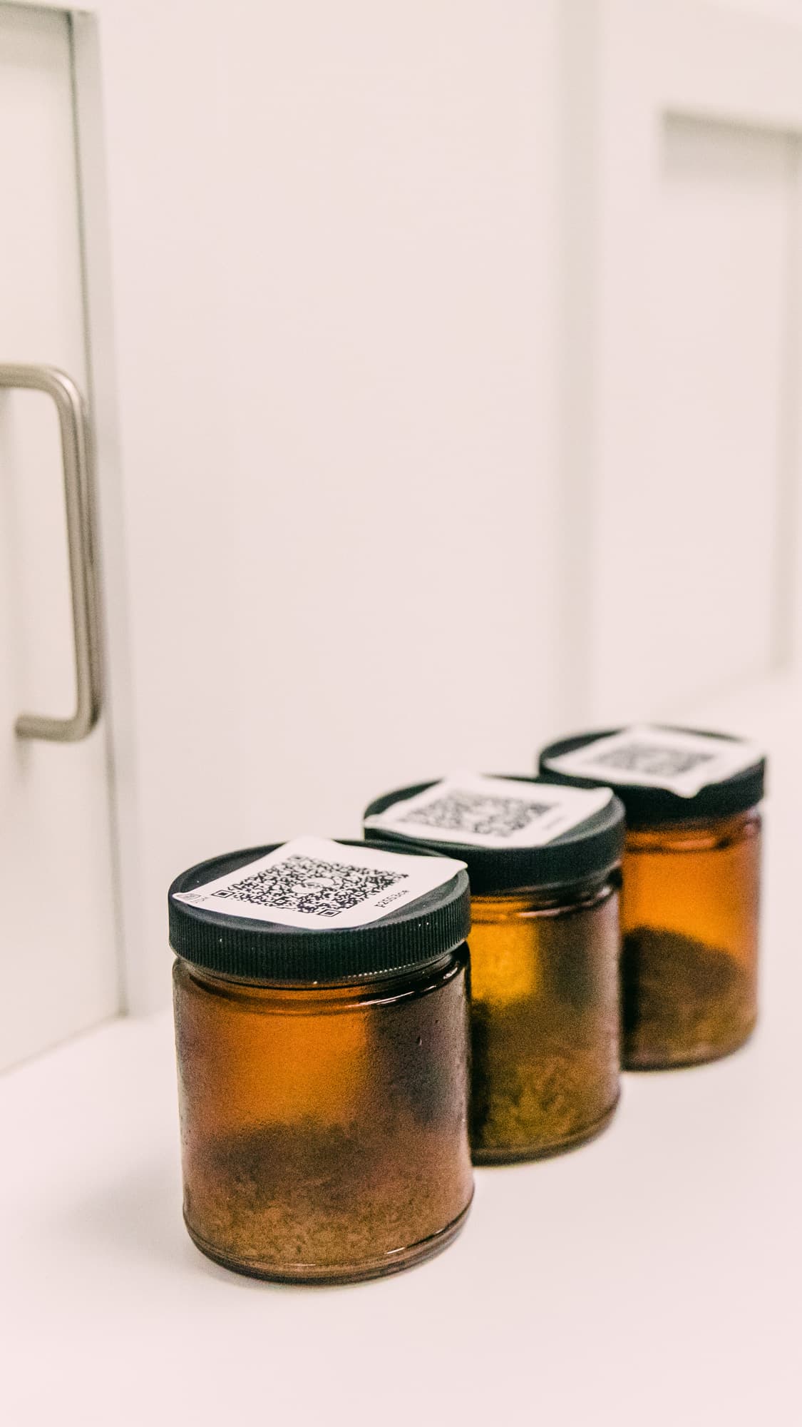 Hop sensory samples in amber glass container