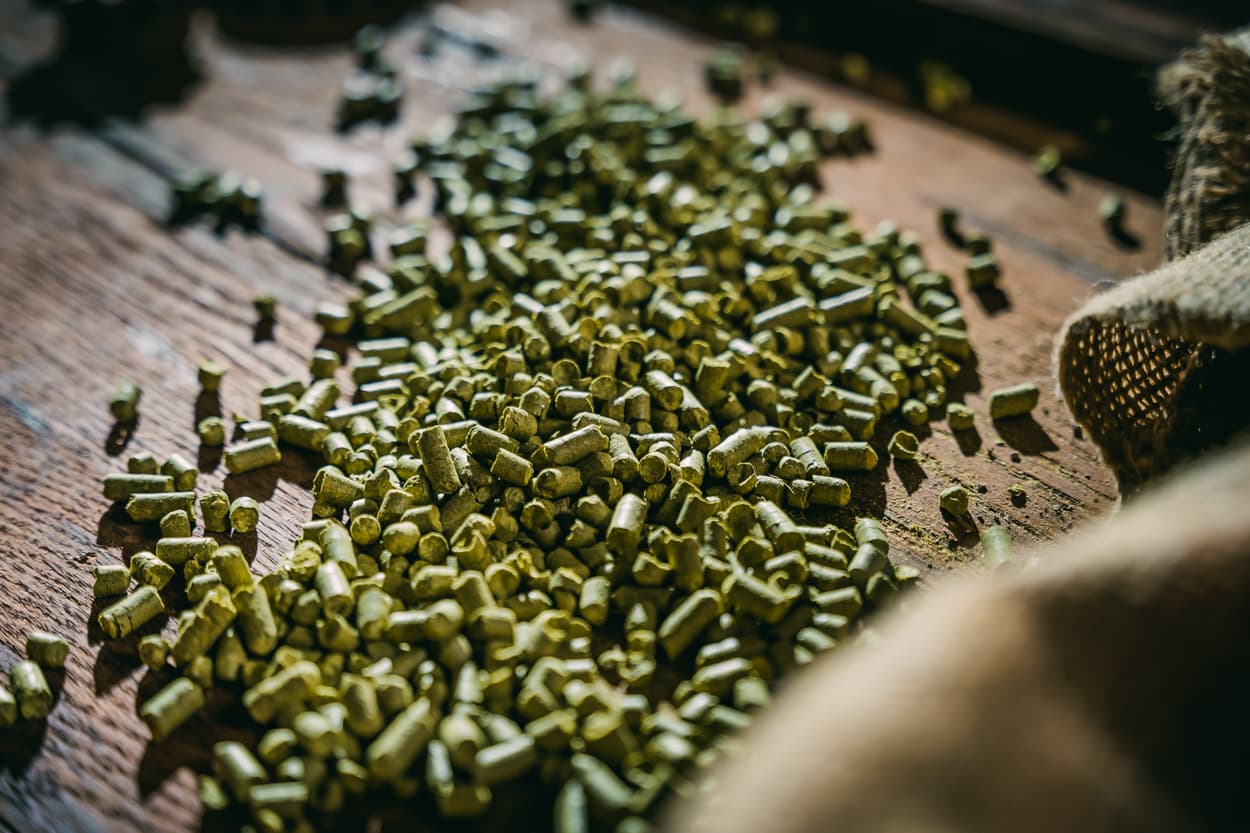 American Noble pellets in a pile on wood tabletop