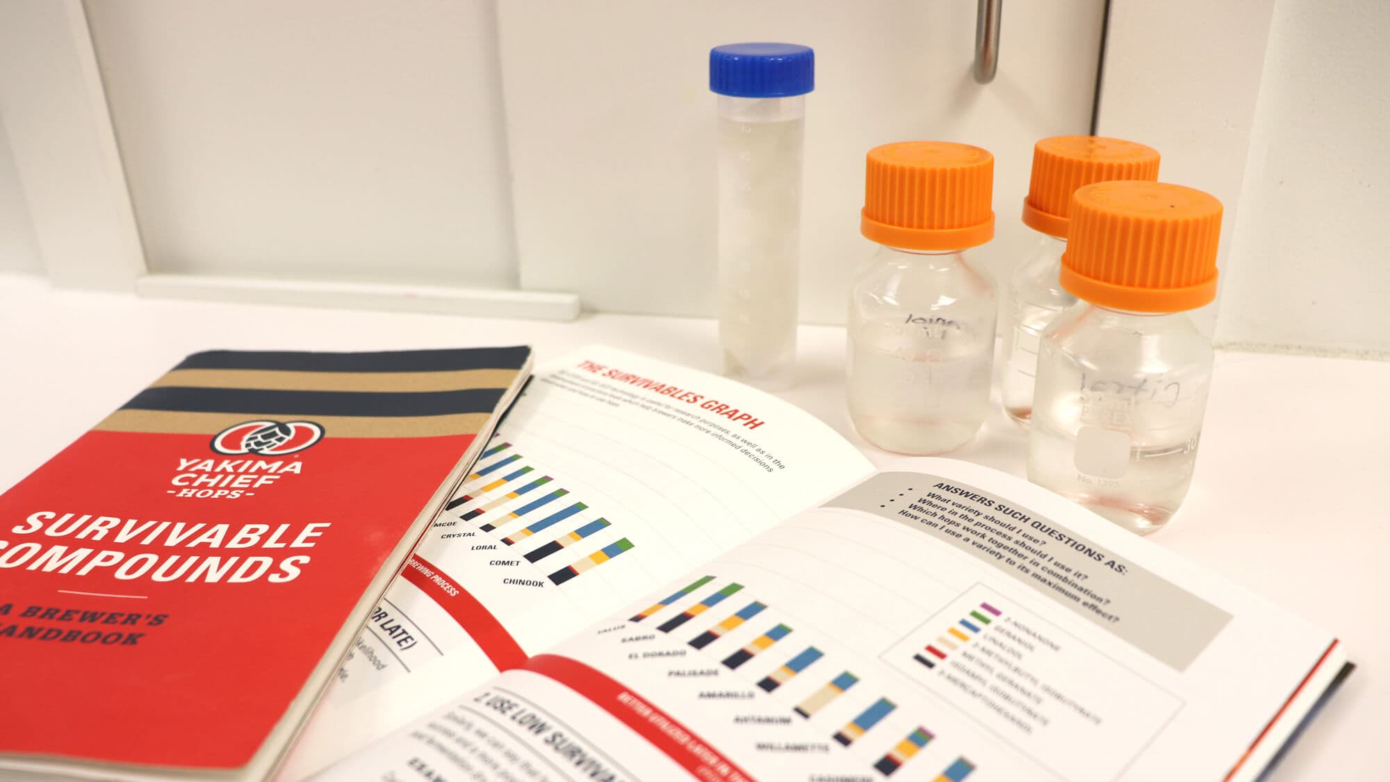 Hop compound research charts and test tubes